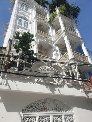 biệt thự nguy nga 5 tầng dát vàng 18k đ. lâm văn bền q.7 giá 11,2 tỷ