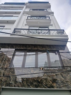 nhà lô góc 6 tầng - thang máy - gara ô tô 7 chỗ - đường phân lô ô bàn cờ, nhiều tiện ích