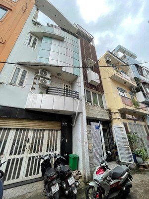 nhà kế góc ngã tư trần hưng đạo, q5 vị trí kinh doanh cho thuê tốt