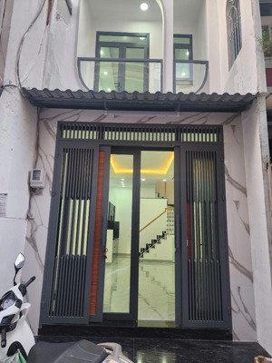 nhà xây mới hẻm xe hơi thông ra 2 đường tiện kinh doanh