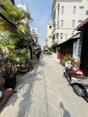 trung tâm quận 6 - nhà mới xây - 52m2 - hẻm ô tô,sau lưng mặt tiền hậu giang-ngay him lam