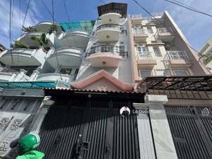 giáp quận 1! dt 4x14m (vuông vức), 5 tầng ở ngay hxh nơ trang long, bt giảm 700 triệu chỉ 9,8 tỷ tl