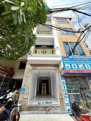 tam trinh 40m2 mặt phố kinh doanh vỉa hè 4m 6 tầng thang máy gara ô tô, 18.3 tỷ