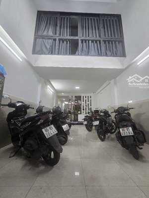 bán nhà hxh . ô tô ngủ trong nhà . nguyễn thị thập . q7. kết cấu 5 tầng . chỉ 11 đồng nhỉnh