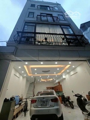 hiếm nhà đẹp 5 tầng dân xây gara ô tô ngõ thông 4 mặt thoáng trung tâm việt hưng.