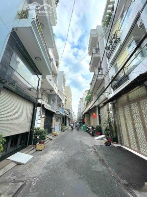 khuông việt - giáp quận 11 - 4.2x20 nở hậu 4.5m2 - 4 tầng - hẻm xe tải thông - dòng tiền 18tr/th