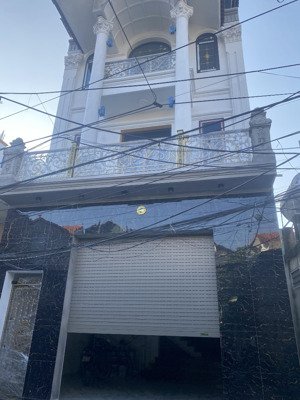 bán nhà phố hoàng văn thái 89m mt 5m 5 tầng thang máy nhà đẹp vuông vắn .cách lê trọng tấn 50m