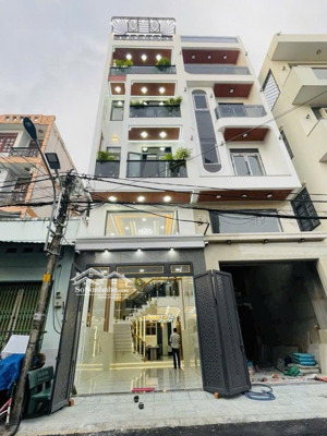 nhà mới 6 tầng q12 - hẻm 2 ô tô tránh - sổ a4 vuông vức, công chứng ngay!