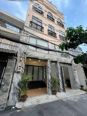 bán tòa chdv 8 tầng + hầm + thang máy doanh thu 1,8 tỷ/năm đối diện lottemart nguyễn văn lượng