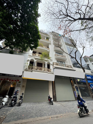 mặt phố mai dịch 7 tầng thang máy kinh doanh sầm uất mặt sau là ngõ 3 gác 60m2 28.5 tỷ