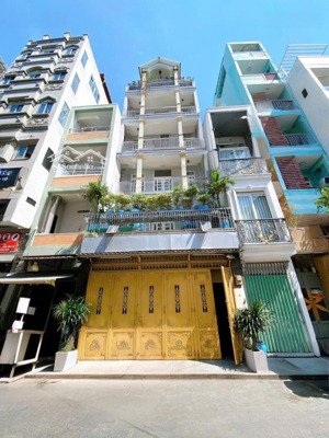 bán gấp nhà quận 10 có gara để được 2 ô tô trong nhà - 5 tầng có thang máy - 122m2 (5.7 x 20)