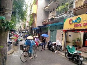 bán nhà phùng chí kiên, dt67m, mt5,1m, mặt phố kinh doanh, ô tô vào nhà.