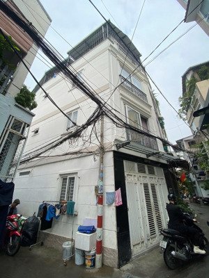 góc hẻm phan xích long,ngang 4m,4tầng,3pn,nhà ko lộ giới,gần trường học,quán ăn,cửa hàng