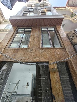 bán tòa chdv hai bà trưng - cách ô tô 30m - 65m2 x 6 tầng - 9 căn 2n1k - doanh thu 70tr/tháng