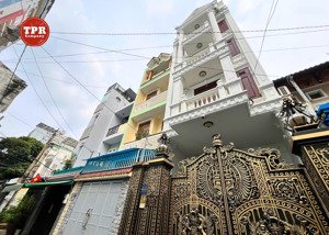 nhà đẹp, hầm + 5 tầng phan văn trị, đối diện emart có thang máy, full nội thất cao cấp, p5, gv