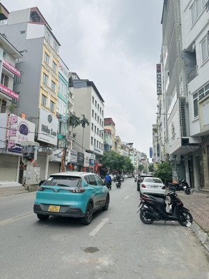 cực rẻ - bán nhà mặt phố trung phụng, 7tầng thang máy, vỉa hè, kd sầm uất