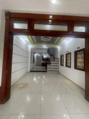 trệt 3 lầu 4x16m có 4pn 5wc xe hơi ngủ trong nhà dương quảng hàm p5 gv giá 21 triệu tl