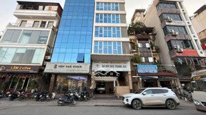 bán tòa building lô góc, kinh doanh, thang máy lê văn lương 75m - 9 tầng - mt6 giá 50 tỷ.