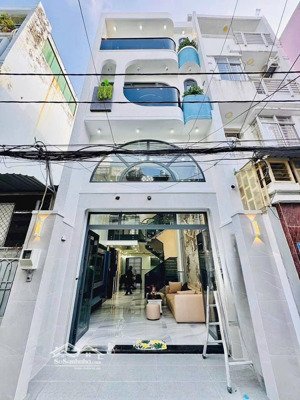 vị trí đắc địa bạch đằng p2 dòng tiền mỗi tháng 40tr/tháng, sổ hồng riêng, 1 trệt 2 lầu sân thượng