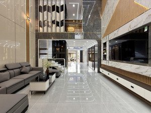 nhà có thang máy, đường thông xe hơi, dt:5x15m, lửng, 3lầu, 4pn, 6vs, gar ôtô, sân thượng, 7.4 tỷ