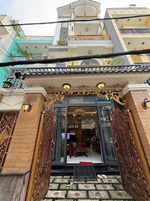 nhà bán 4 tầng 5,2 x 14- (nở h 5,6)-75m2- dt sàn:211m2-5 pn,5 wc nội thất gỗ đẹp hẻm bông sao p5q8