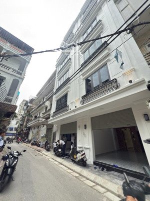 ba đình - 7 tầng thang máy - ô tô vỉa hè - kinh doanh sầm uất