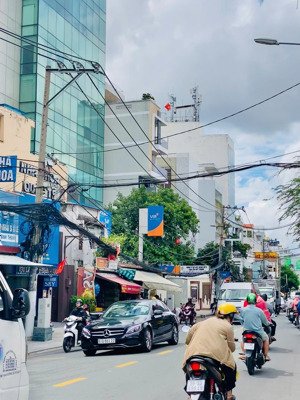 bán tòa nhà hầm 7 tầng gần 1400m2 sàn hđt 180 triệu/th mặt tiền lê quang định p14 bình thạnh 73 tỷ