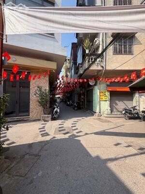 Bán nhà ngõ Thông Phong 21m2 2 mặt ngõ kinh doanh tốt gần bệnh viện Tràng An 7.4 tỷ