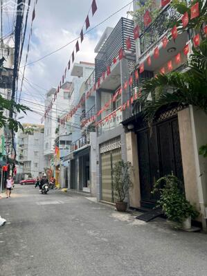 CHDV 4 Tầng,12Pn,TN 1 tỷ/năm, ngang 5.5m, 94m2, gần HXH Nguyễn Văn Trỗi Phú Nhuận,18.x Tỷ