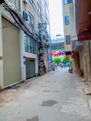 BÁN TÒA NHÀ CCMN MẶT NGÕ Ô TÔ TRÁNH ĐƯỜNG TRƯỜNG CHINH. 90M2 - 7 TẦNG. THANG MÁY.