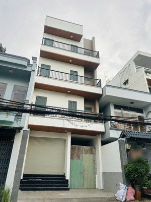 bán chdv hầm + 4 lầu ngang 6m siêu đẹp mặt tiền đường cách đỗ xuân hợp 100m, dòng tiền 40 triệu/th