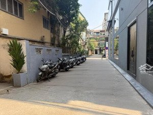 bán nhà phố hoàng cầu - cạnh quận uỷ - 7 tầng thang máy - ô tô - 2 thoáng - 82m mới đẹp