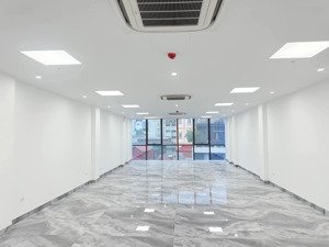 bán tòa nhà mp chùa láng đống đa dt 112/135m x 9t x mt 6m giá 115 tỷ có thương lượng