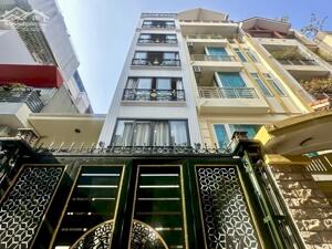 Nhà 7 Tầng Thang Máy Hoàng Cầu - Đống Đa, 10PN, ô tô cửa, sổ đỏ 71m2 - Ở/Văn Phòng