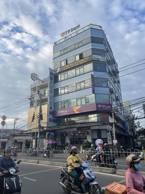 bán tòa nhạc góc 2mt lê văn quới q.bình tân, 13mx25m cho thuê 320tr/th giá 95tỷ.