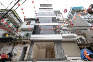 cho thuê nhà hoàng cầu - đống đa - 65m² x 7 tầng - thông sàn, thang máy, giá 37tr/ tháng