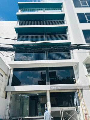 tòa nhà đường quang trung 9x28m hầm 6 lầu cho