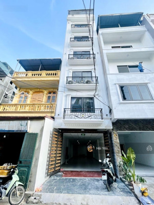 phân lô ô tô - thái hà - lô góc 3 thoáng - 57m x 6 tầng - vỉa hè - 30m ra phố - giá: 31.5 tỷ (tl)