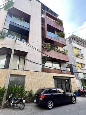 14 phòng - khoán 66 triệu - 6 tầng, thang máy - đường ô tô phan đăng lưu - nhỉnh 15,5 tỷ tl