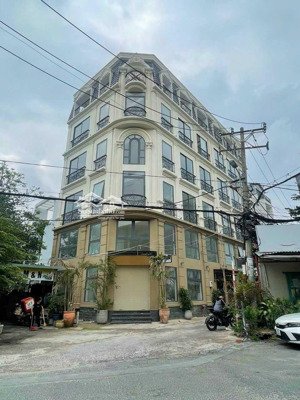 nhà đẹp - giá tốt! góc 2 mặt tiền phổ quang (7x26m), hầm 5 tầng, hđt 110tr/tháng