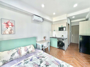 phòng mới ban công máy giặt riêng ngay chợ bà chiểu