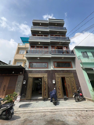 bán nhà 5 tầng hẻm 8m thông 1/ lê văn quới 4x22m có thang máy giá 11.5 tỷ