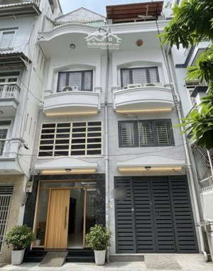 hẻm xe hơi khu phan xích long - 40m2 - nhà mới 4 tầng - 6 phòng ngủ - có sân chung đậu ô tô