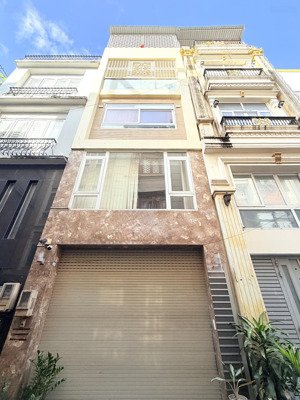 toà nhà 6 tầng sát mặt tiền phạm văn đồng - thang máy - 70m2 - 10 phòng