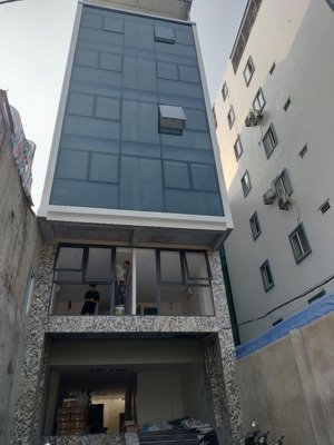 bán toà nhà văn phòng kết hợp ở mặt phố trịnh văn bô - 170m x 8 tầng - dòng tiền 200 triệu/tháng
