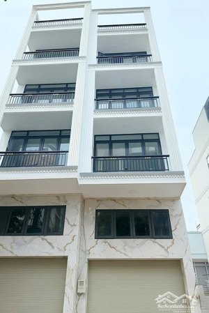 nhà xây mới - toà nhà mặt tiền đường kinh doanh - ngay lê quang định gần phạm văn đồng