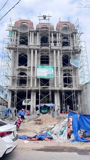 bán nhà 1 trệt 3 lầu mặt tiền đường đông tác tân đông hiệp dĩ an. nhà đang hoàn thiện giá 7,55 tỷ