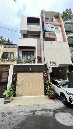 chủ định cư- bán nhà mặt tiền cửu long - cư xá bắc hải q10 - 4,5x25 - 5 tầng st - 19ty.