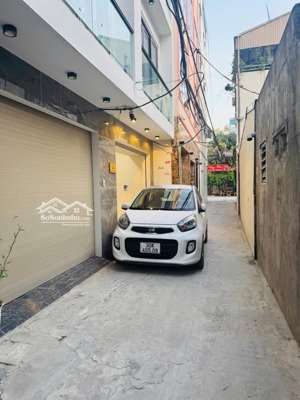 nhà mới đông dư 40m2 5 tầng thang máy fuji xịn ô tô đỗ cửa - ngõ nông - tiện ích xung quanh đầy đủ