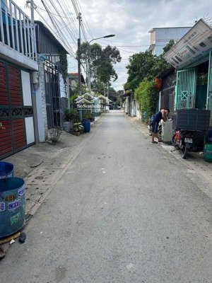 nhà trệt lầu cũ sát ql 1k - diện tích 123m2 ngang 4.5m dài 27m. nhà lầu trệt cũ - đường nhựa thông